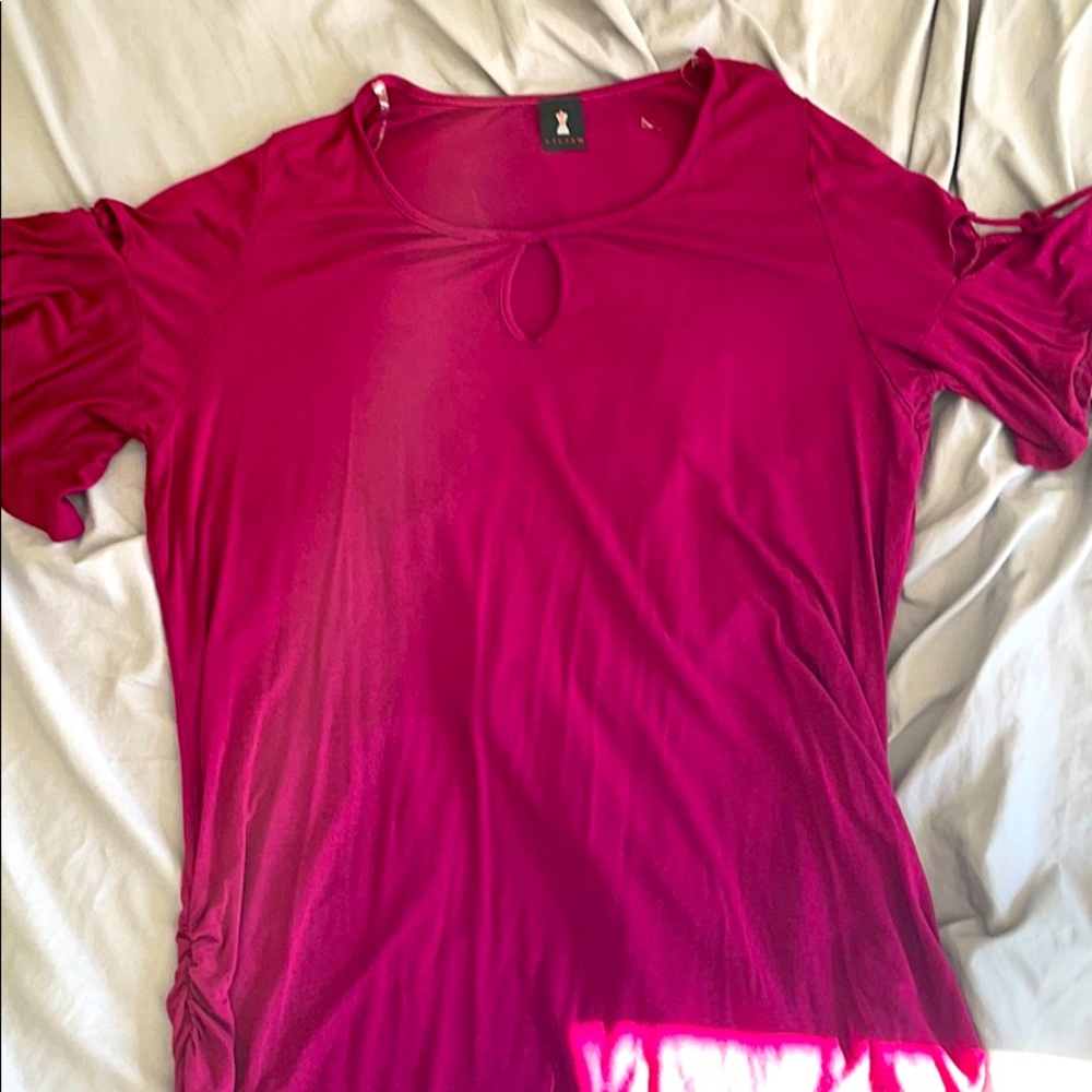 Maroon dress shirt with key hole in front.